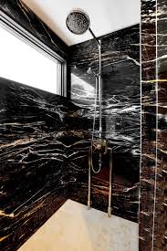 Black And Gold Tiles Bathroom Zebrino Black And Gold Marble Cladded Bathroom Aria Stone Gallery Black And Gold Marble Marble Bathroom Marble Bathroom Accessories