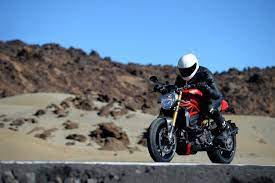 First Ride 2014 Ducati Monster 1200 S Review Rideapart Ducati Monster 1200 Ducati Monster Ducati Monster 1200 S