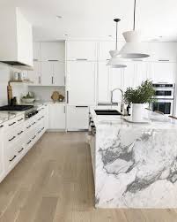 Thin subway tiled backsplash is a focal point. I Spy A Few New Mcgeeandco Arrivals In This Little Iphone Sneak Peek Of Our Mercerislandproject See The L Kitchen Design White Kitchen Design Home Decor