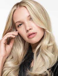 Friedman says toners that have more of a blue tint to neutralize any unwanted orange cast and purple toners to. Creamy Blonde Hair Color Redken