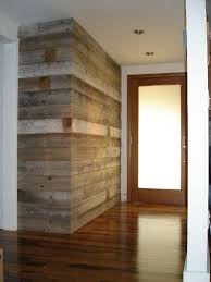 This brand offers you the look of modern luxury but at an affordable price you can live with. Entryway Wall Built With Reclaimed Barn Wood Concealed Closet Door House Design Wood Accent Wall Reclaimed Barn Wood