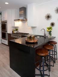 A Sleek Look Effect Is Provided With A Black Quartz Waterfall Countertop Which Is Durable Kitchen Design Small Small Kitchen Layouts Kitchen Bar Design