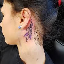 An eagle is a symbol of courage and focus. Beautiful Colourful Wrist Tattoo Feather Tattoo Ear Feather Tattoo Behind Ear Neck Tattoo