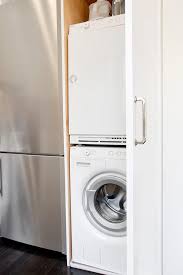 Also, the estimated wash time is long. Kitchen Cabinet With Stacked Washer And Dryer Transitional Kitchen