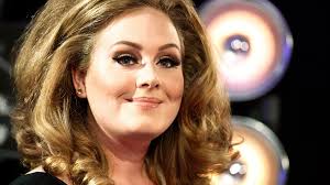 Adele premieres intimate new song - BBC News