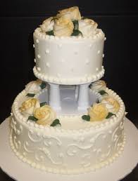 Pale Yellow Sprayed Roses On Our 2 Tier Buttercream Iced Cake Traditional Wedding Cakes Cake Ice Cake