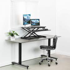 Some people may prefer a full standing desk replacement, but i actually find these converters very practical and convenient to use especially at times when i want to stand up, stretch. 8 Best Standing Desk Converters 2021 The Strategist New York Magazine