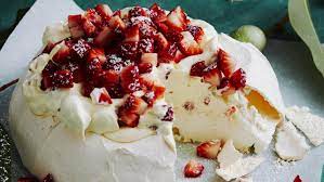 Pavlova is a dessert popular in new zealand and australia. Classic Pavlova With Strawberries Cappuccino Meringue Kisses