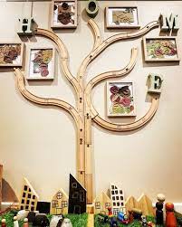 Families Are Like Branches On A Tree We Grow In Different Directions Yet Our Roots Remain As One Reggio Inspired Classrooms Classroom Tree Preschool Rooms