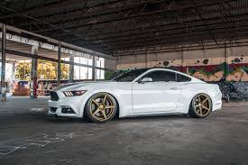 White Car Black And Bronze Wheels What Makes An S550 Gt Look Even Better How About Some Bronze Classic5s From Velgen Wheels These Wheels Are Available Eit Mustang Mustang Wheels Mustang Cars