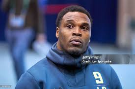 Indiana linebacker Chris Covington answers questions from the media... News  Photo