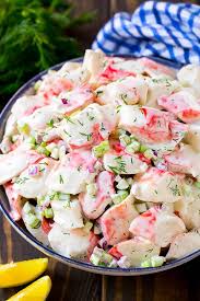 This Crab Salad Is A Blend Of Imitation Crab Vegetables And Herbs All Tossed In A Simple Crea Sea Food Salad Recipes Crab Salad Recipe Summer Seafood Recipes