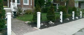 Now, we are starting to install the cedar split rail fence inserted into the cedar posts holes. Fence Ideas
