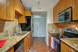 small galley kitchen design with black