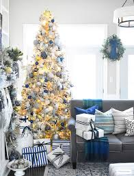 Finish your design with cascading blue and red velvet ribbons. 10 Elegant Christmas Tree Decorating Ideas Iconic Life