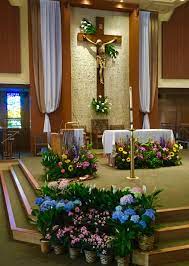 Catholic altar in a church with candles and flowers. Holy Spirit Catholic Church Easter 2016 Church Altar Decorations Church Easter Decorations Easter Church Flowers