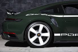 Image result for Black Olive 2025 Porsche