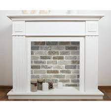 We will be putting together a wood mantel that can just slip over the existing one!in the mean time, i hope you get a better understanding on how you can recreate this for yourself. Nextwall Washed Faux Brick Grey And Rust Vinyl Peel Stick Wallpaper Roll Covers 30 75 Sq Ft Nw30500 The Home Depot