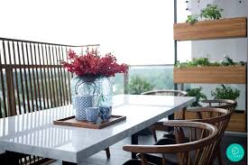 Double dining table in teak, from $2,295, soul & tables. 5 Ideas To Invigorate Your Hdb Condo Balcony Qanvast