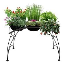 Home depot sells many items needed for home repair and improvement both inside the home or out. Garden Table 46 5 In W X 23 8 In D X 30 In H Graphite Plant Stand Gt01gp The Home Depot Metal Garden Table Planter Table Garden Table