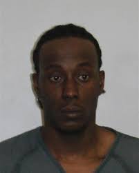 Hardee's worker charged in masked, armed holdup at restaurant