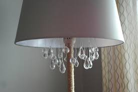 I found the chandelier at my favorite thrift store and a few of the strands of beads had come loose but it was so. Remodelaholic Upcycled Diy Chandelier Lamp