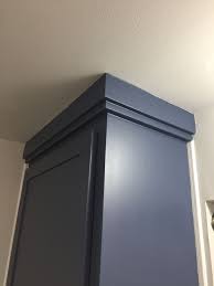 The Cabinets Were Lacking Style Just Square Boxes So We Overlapped Wood Trim At The Top F Crown Molding Kitchen Kitchen Cabinet Crown Molding Cabinet Molding