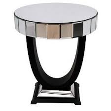 Quartz is a hard, crystalline mineral composed of silicon and oxygen atoms. Quartz Black Mirrored Side Table Shropshire Design