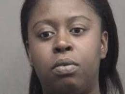 Woman charged in home invasion
