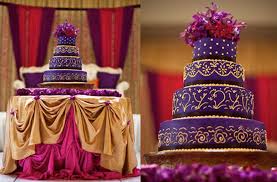 Simple and elegant three tier white round cake with purple and green satin ribbon dividing the tiers and on purple flower attached to top cake tier. Wedding Cakes With Pops Of Purple Ideabook By Onewed On Onewed