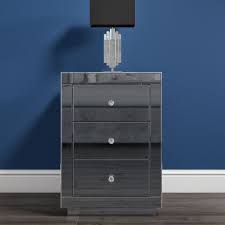 These tables are functional for your nighttime essentials, and they serve an aesthetic purpose in your sleeping space as well. Eva Grey Mirrored 3 Drawer Bedside Table With Crystal Effect Handles Furniture123