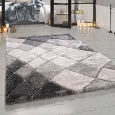 Teppich panchu aus 45% wolle & 45% viskose & 10% baumwolle online bestellen | silbergrau & grau ✓ gratis versand ab 50€ ✓ 100 tage retourenrecht. Shaggy Teppich Rauten Design Hochflor Grau Teppichcenter24