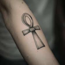 The egyptian cross also known as the ankh is tattooed on the forearm with a sacral scarab beetle on the top. 20 Powerful Ankh Tattoo Ideas Analogy Behind The Ancient Symbol