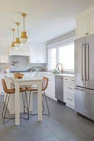 Classic tile accents a white french country kitchen. Traditional Grey Herringbone Kitchen Transitional Kitchen Newark By Fireclay Tile Houzz