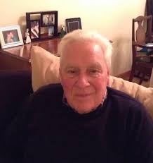 Michael James (Mickey) McLaughlin at his home, 25 Ballynasilloe Avenue,  Derry, formerly of Lewis Street, Rosemount