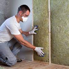 I'd go with mineral wool (or fiberglass) since some sound isolation is often desirable between bedroom and bathroom and foam is not great at that application. Should You Insulate Your Interior Walls Dfw Thermal Solutions