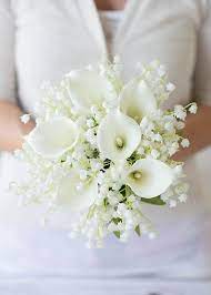 Once secured, using a wide satin ribbon that matches one of your wedding colors, wrap the stems to cover the tape, and finish it off with a simple. White Calla Lily Wedding Bouquet Silk Wedding Flowers Afloral Silk Wedding Bouquets Flower Bouquet Wedding Calla Lily Bouquet Wedding
