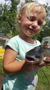 I had no idea today was National Catfish Day until Claire Fookes sent me  this photo of her son, Aden and his huge catch! That's a 50 lb catfish  that's the size