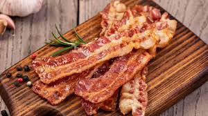 Delicious strips of juicy, pork heaven. The Secret To Making Perfect Bacon According To A Golf Club Chef