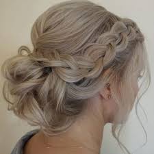 This style involves two feeder french braids rolled in the back of the head and coiled into a chignon, which is then secured with pins. 80 Gorgeous Braided Updos For All Hair Types