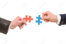 Create a custom puzzle and share it or add it to your own website. Close Up Of Hands Trying To Connect Small Jigsaw Puzzles Over White Background Stock Photo Picture And Royalty Free Image Image 40755550