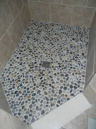 River rock shower floor with shluter membrane base in bathroom renovation with lots of different tile applications. 26 Best Diy Bathroom Ideas And Designs For 2021