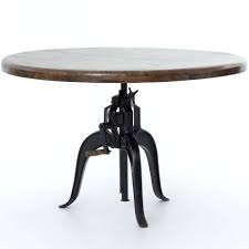 Further its height adjustable and on castors. Interior Style Rockwell Adjustable Round Dining Table With Cast Iron Base Sprintz Furniture Kitchen Tables