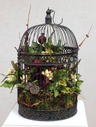 Birdcage Decor Bird Cage Ideas Floral Arrangement Inside A Vintage Birdcage Bird Cage Decor Bird Cage Centerpiece Decorative Bird Houses