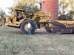 First one is one of my boys senior pictures. With the 1971 637c he claims  as his.Second two are him running it. And yes he is becoming a very  competent operator.