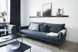 Black And White Living Room With Grey Couch A Striking And Moody Finnish Home Dark Grey Living Room Dark Grey Sofa Living Room Living Room Scandinavian