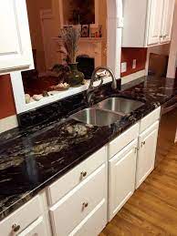 Black Titanium Granite This Granite Has A Black Background With Gold Streak Granite Countertops Kitchen Granite Countertops Dark Granite Countertops Kitchen