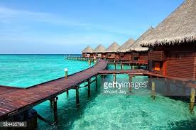 House On Stilts On Maldives Island Wood Pontoon With Blue Lagoon Maison Sur Pilotis Cite Lacustre Maison