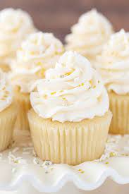 Easy Vanilla Cupcake Recipe Moist Fluffy Vanilla Cupcake Recipe Easy Vanilla Cupcakes Desserts Moist Vanilla Cupcakes