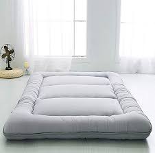 You have options when it comes to the style of their outer coverings and materials filling their interior. 10 Best Japanese Futons For The Ultimate Sleep Anime Impulse Mattress On Floor Japanese Floor Mattress Japanese Futon Mattress